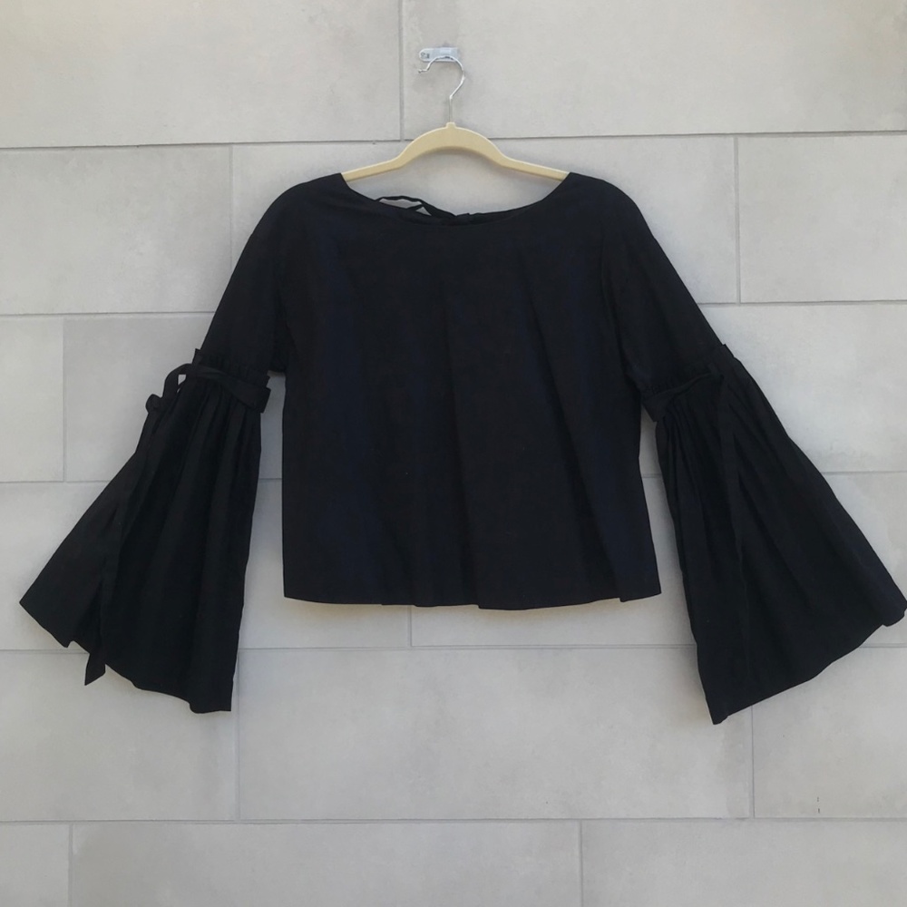 Black blouse with bell sleeve with draped details
